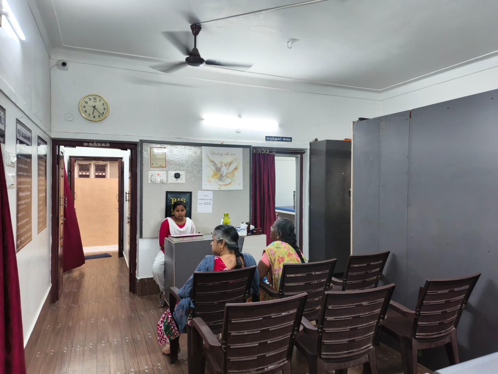 Doctor checking patient for general medicine diabetes consultation at Nile Medical Centre