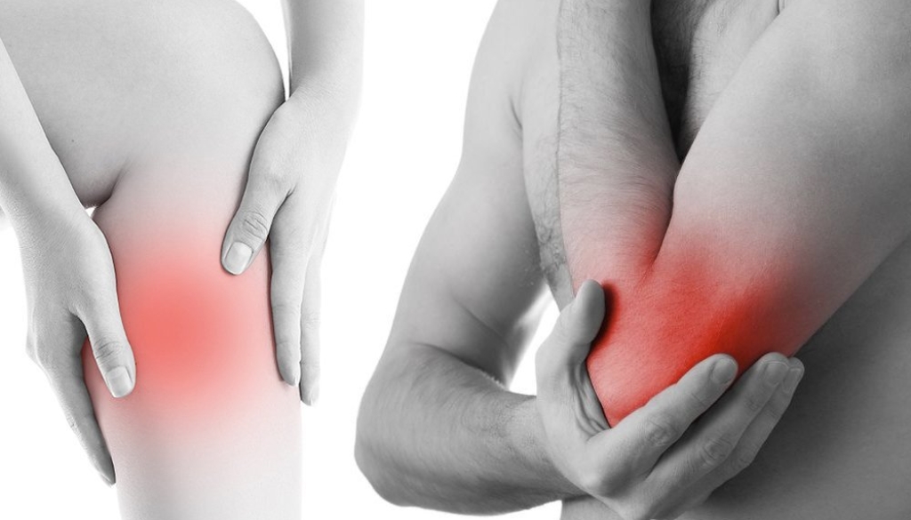 Clinical practitioner testing and performing physical reflex and nerve mobility assessments on a patient's lower leg and foot