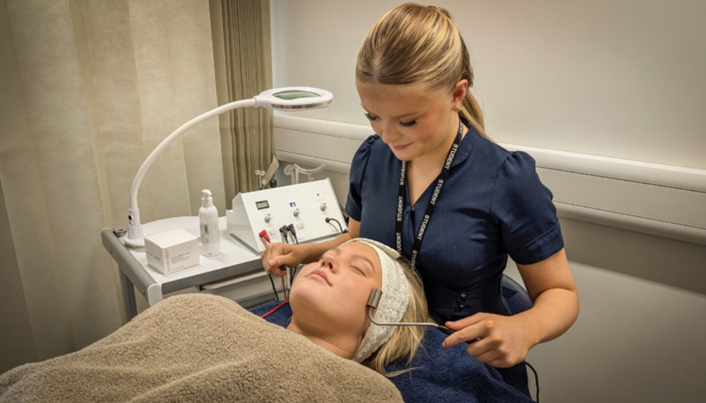 Experienced female physical therapist providing specialized rehabilitation care to a female patient